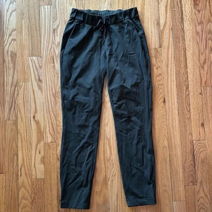 Lululemon sz 2 On The Fly Pant 28" Dark Olive Full-On Luxtreme great pre owned